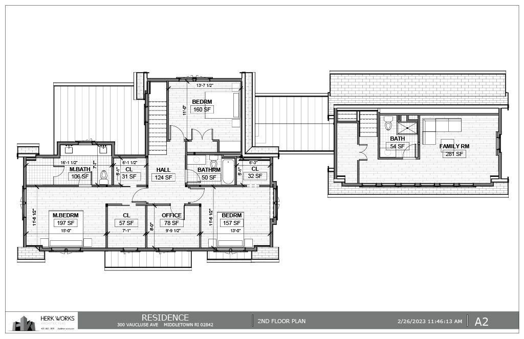 Architectural floor plan of a multi-room house and a separate structure, connected by a walkway.