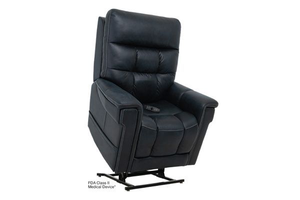 A dark blue power lift recliner chair in a raised position on a white background.
