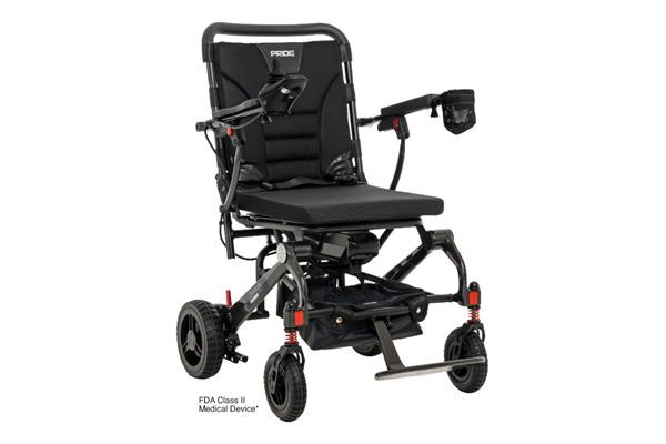 A black foldable power wheelchair with a padded seat, armrests, and a storage basket underneath, set against a white background.