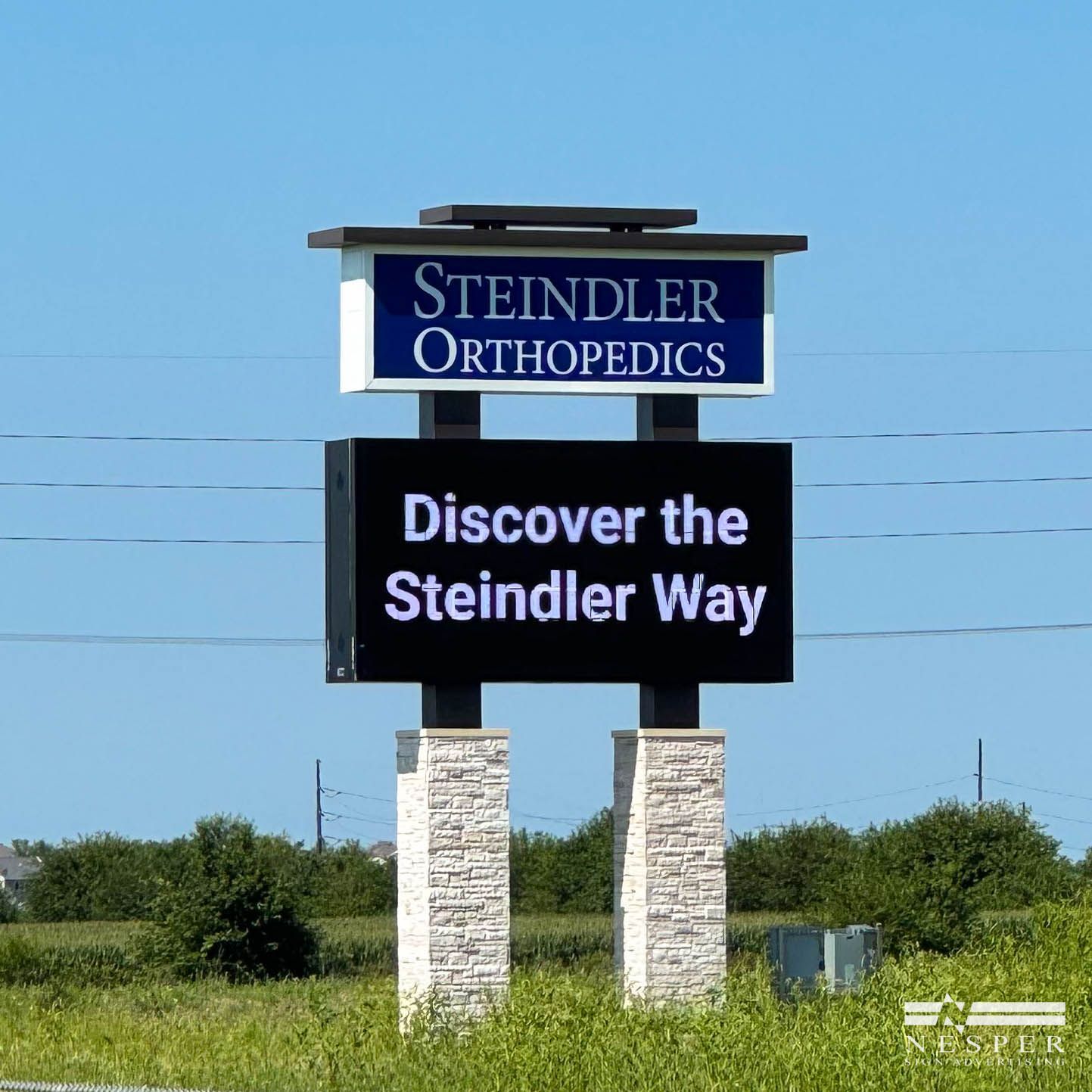 Sign for Steindler Orthopedics, with a digital display reading 