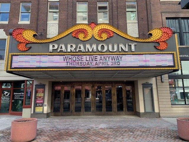 Paramount Theatre with marquee advertising 