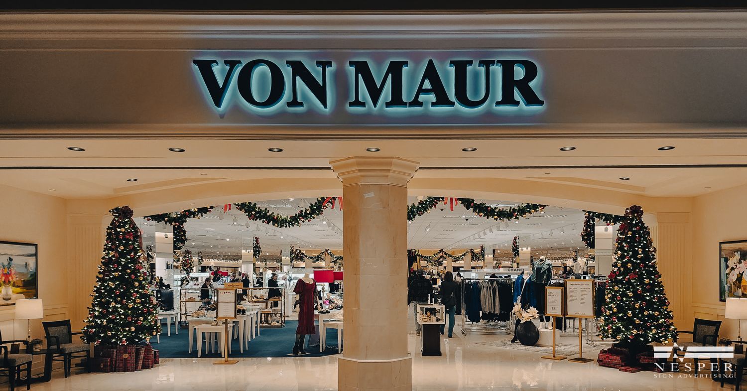 Von Maur department store entrance with Christmas decorations.
