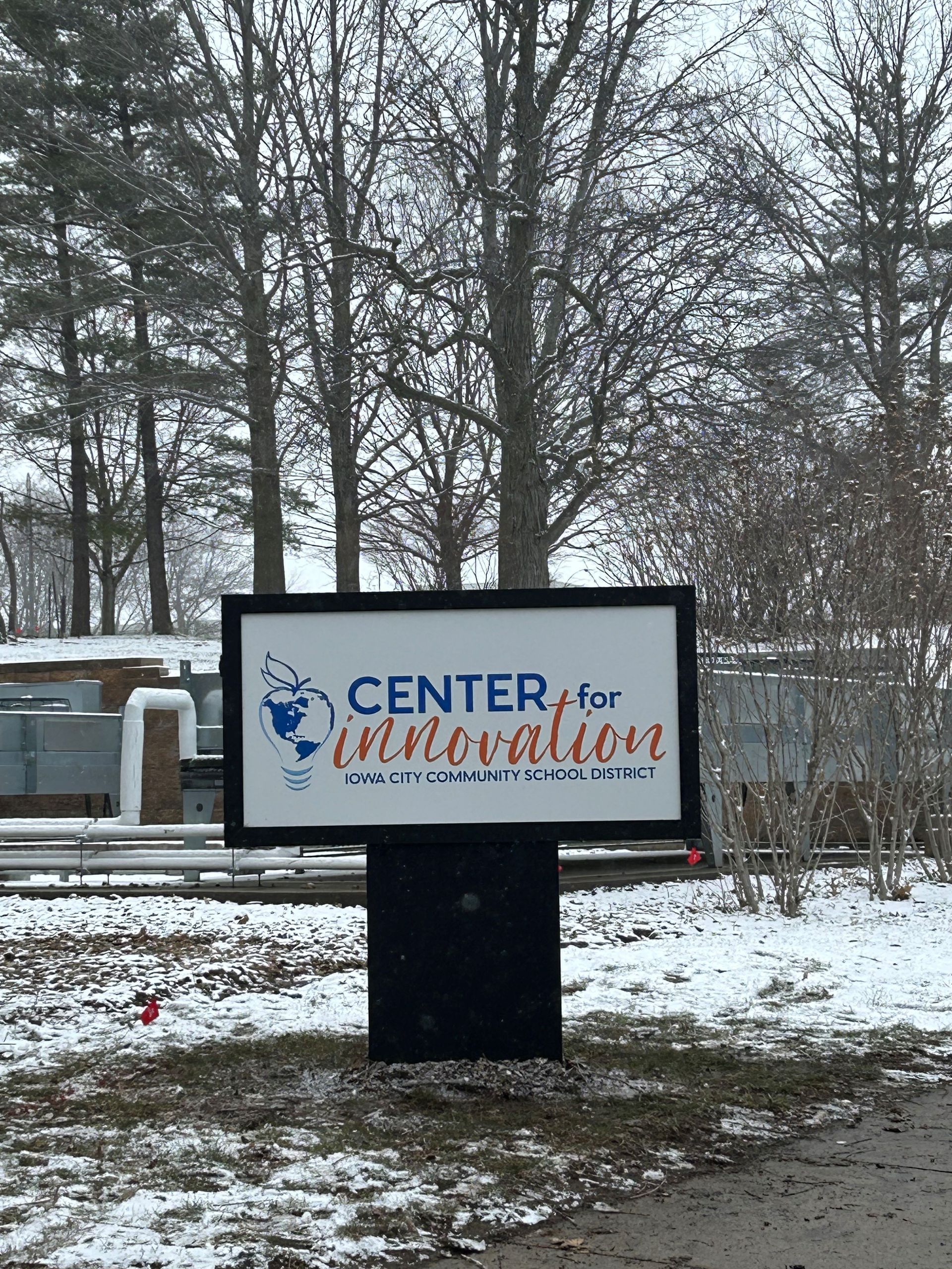 A building with a sign that says center for innovative