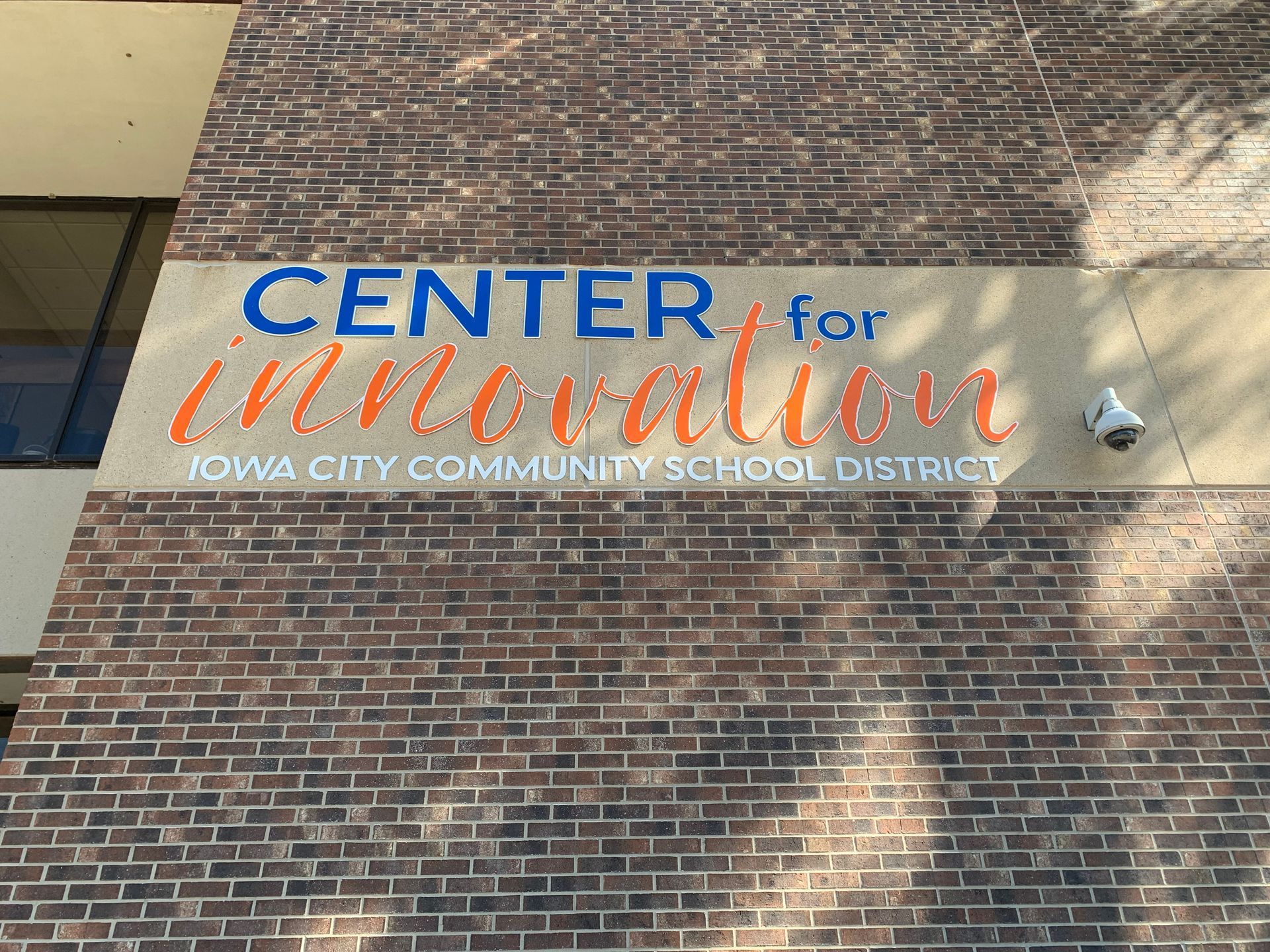 Sign on brick building: