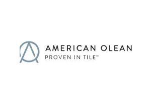 American Olean logo with slogan “Proven in Tile” in gray-blue on white background