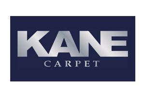KANE CARPET logo in white on a dark blue background