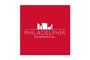 Philadelphia Commercial logo on a red square background