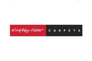 Godfrey Hirst Carpets logo with white script on red and black horizontal blocks