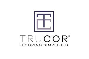Trucor flooring logo with gray monogram and the tagline “Flooring Simplified”