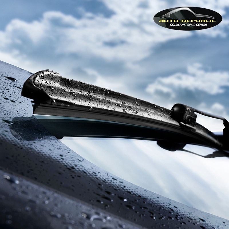 A close up of a windshield wiper with the auto republic logo in the background