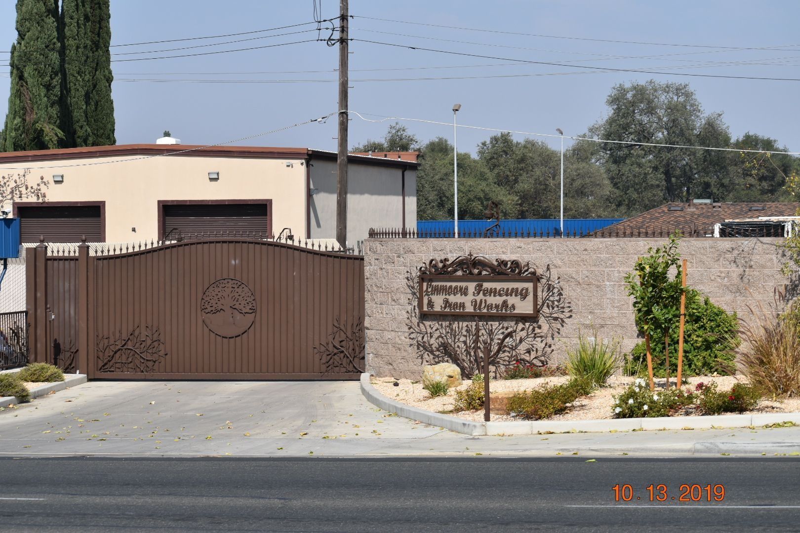 Brown gate and sign for 