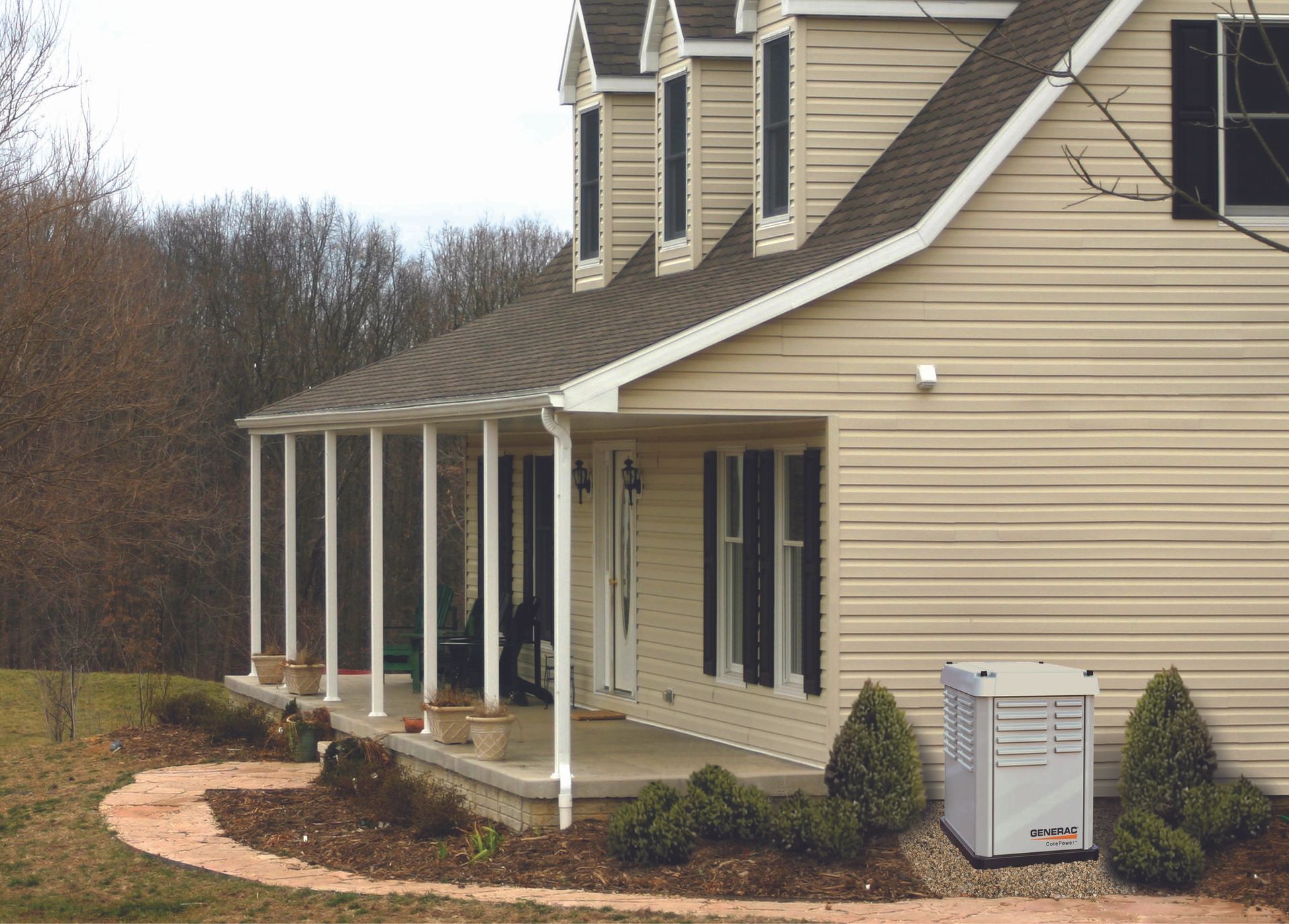 Suburban beige house with white porch columns and a landscaped front yard under cloudy skies