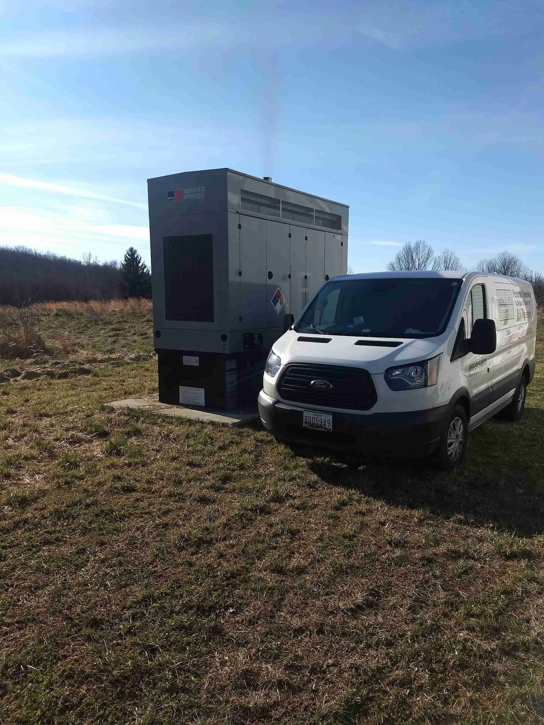 White pickup truck beside a gray box trailer in a grassy field under a clear blue sky.