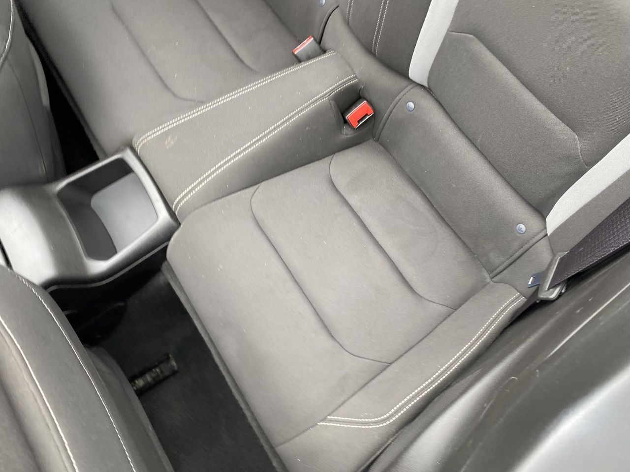 A close up of the back seat of a car.