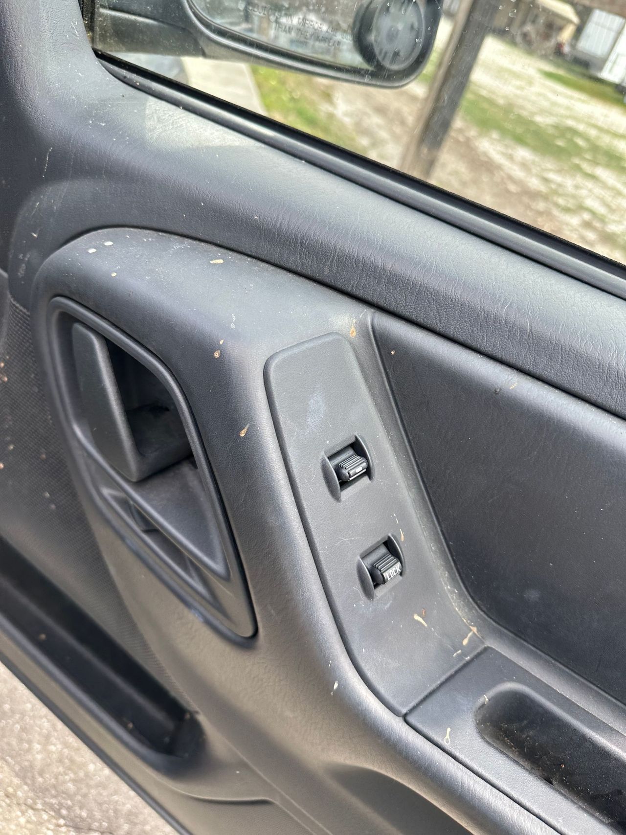 A close up of a door handle on a car