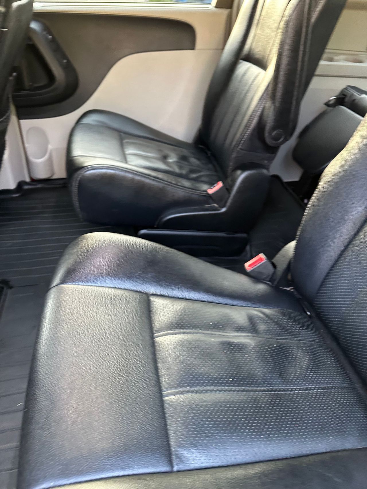 A close up of the back seats of a car