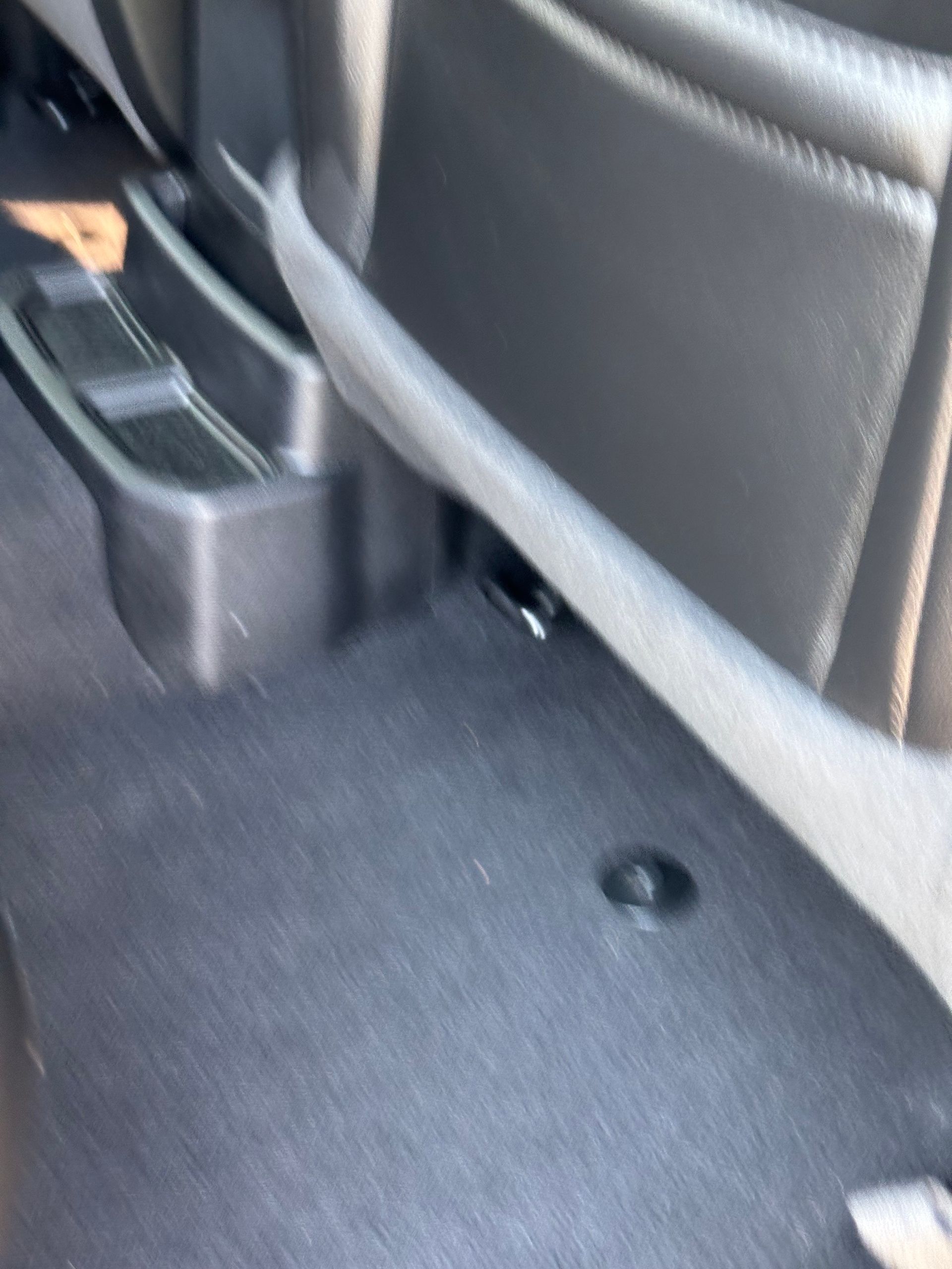 A close up of the back seat of a car