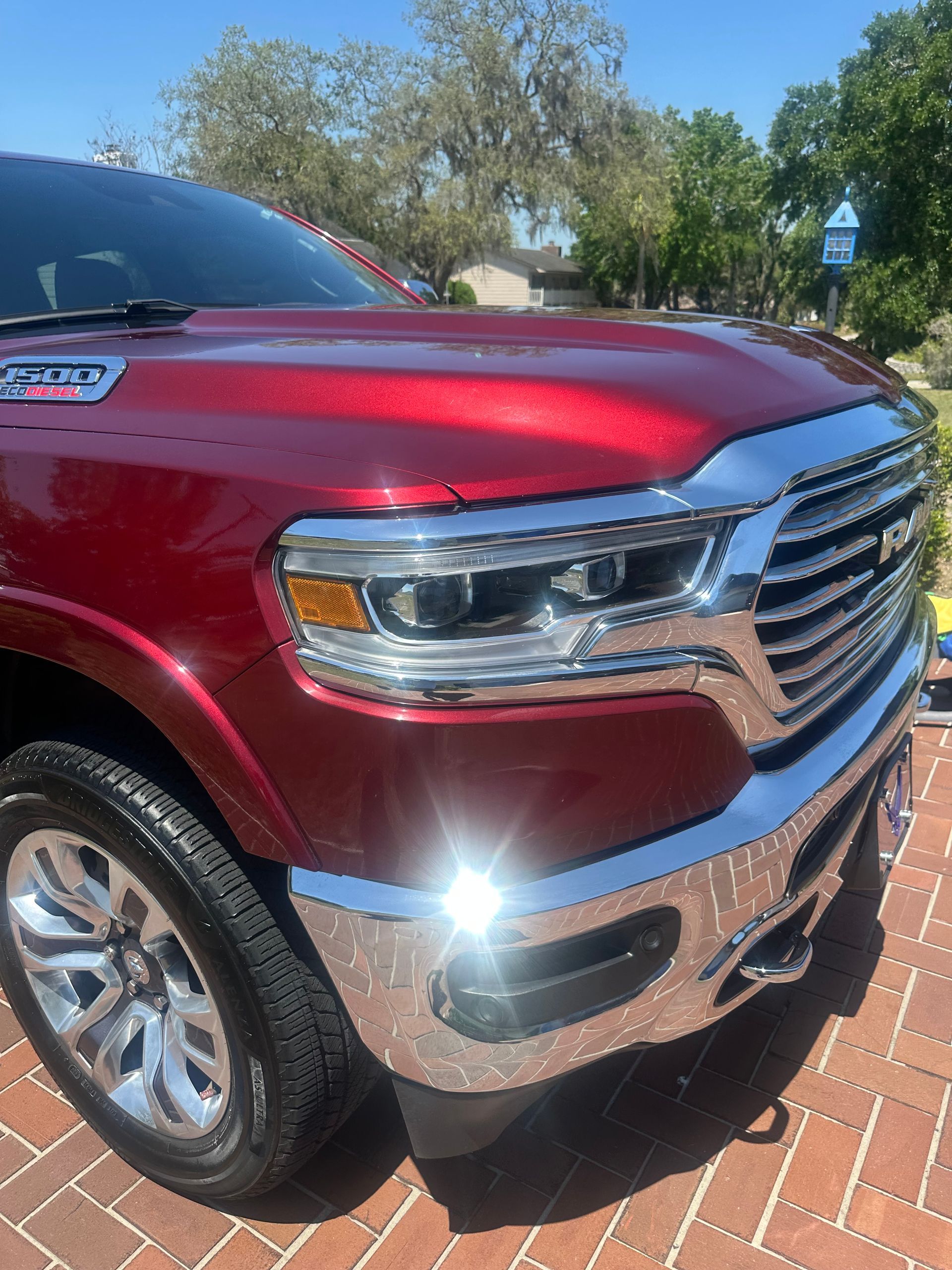 Passenger front corner or a red Ford truck