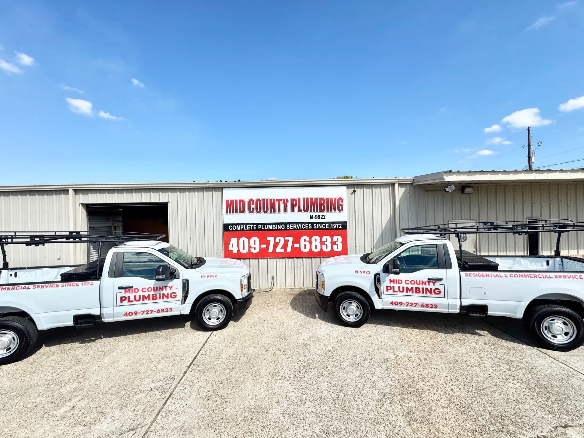 Mid County Plumbing building and trucks