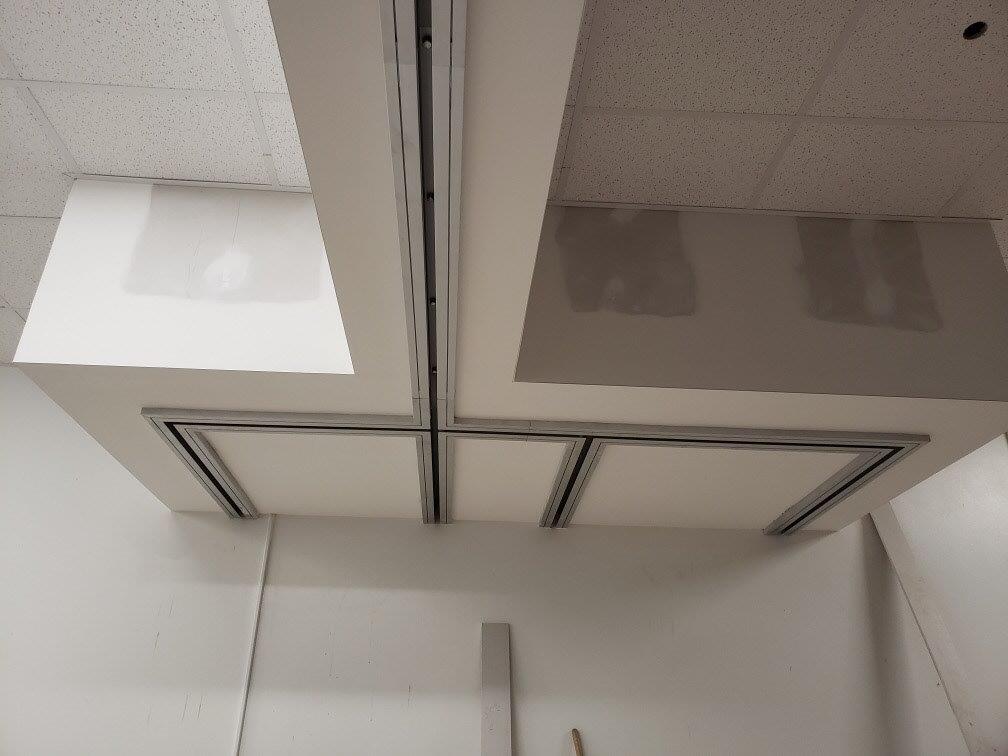 A room with a ceiling that is being remodeled