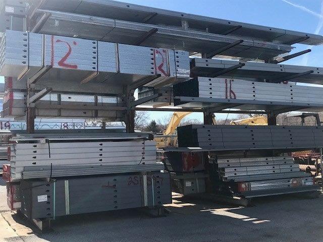 A bunch of metal shelves with the number 2 on them