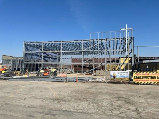 A large metal structure is being built