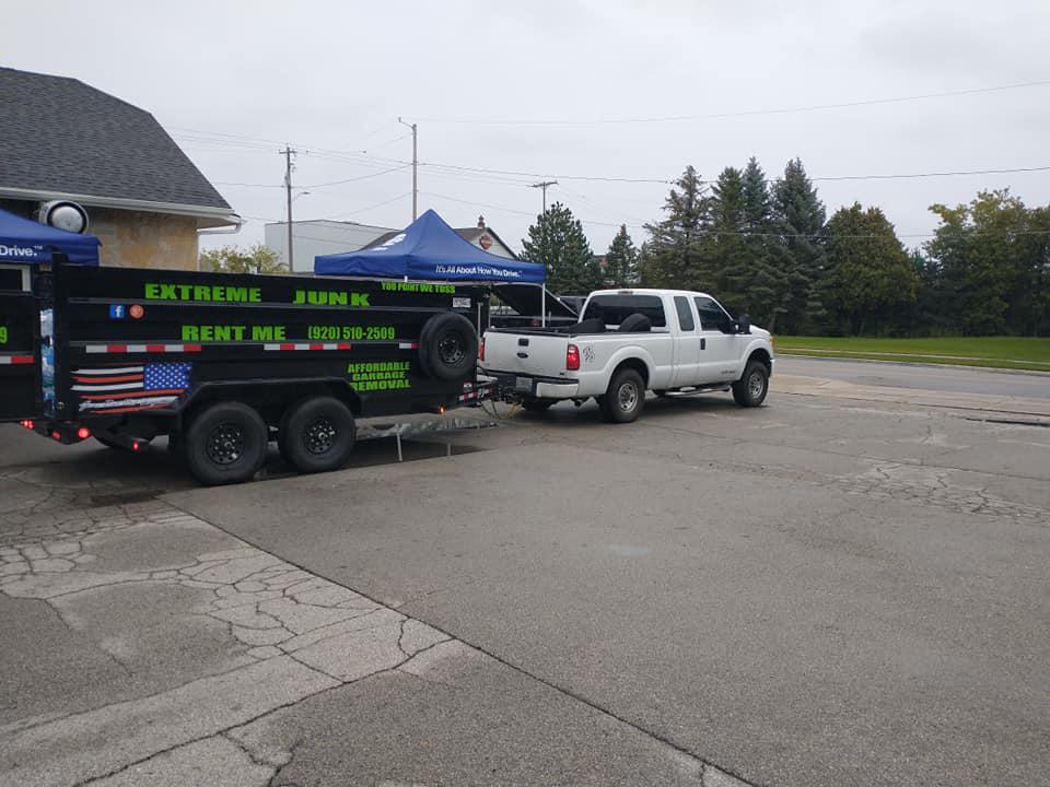 Truck pulling collected junk