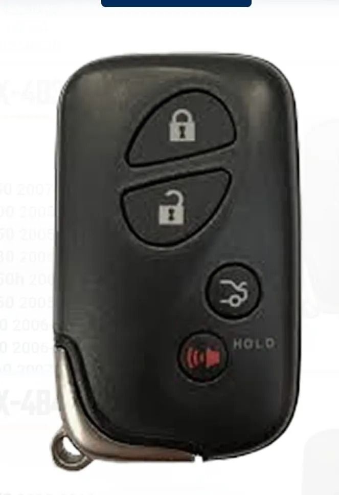 Black car key fob with lock, unlock, and panic buttons.