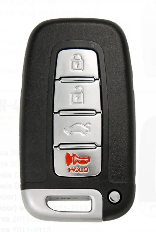 Black and silver car key fob with lock, unlock, trunk, and panic buttons.