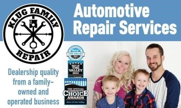 A family standing in front of a sign that says automotive repair services