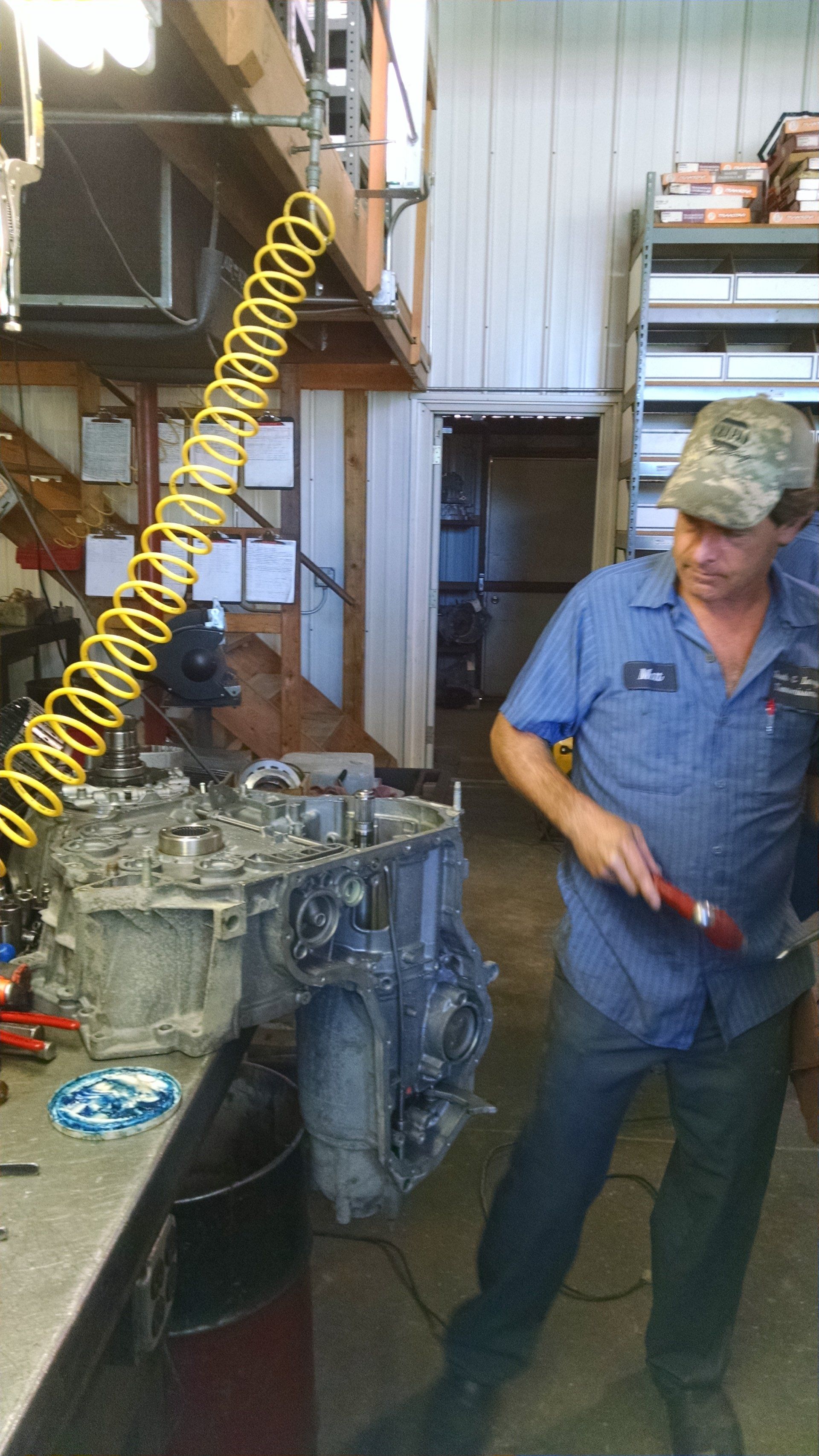 Technician checking a transmission
