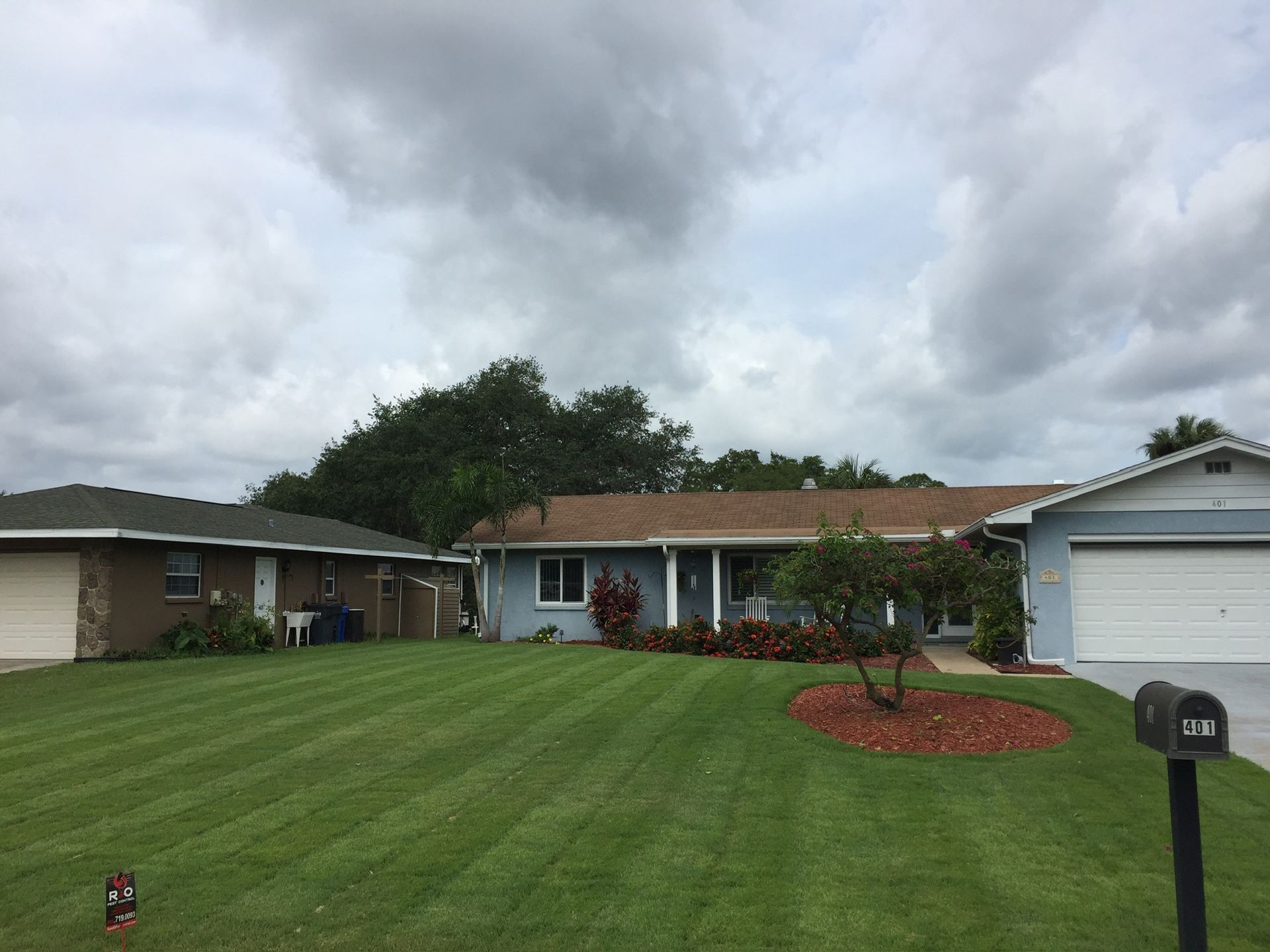 A house with a mailbox in front of it