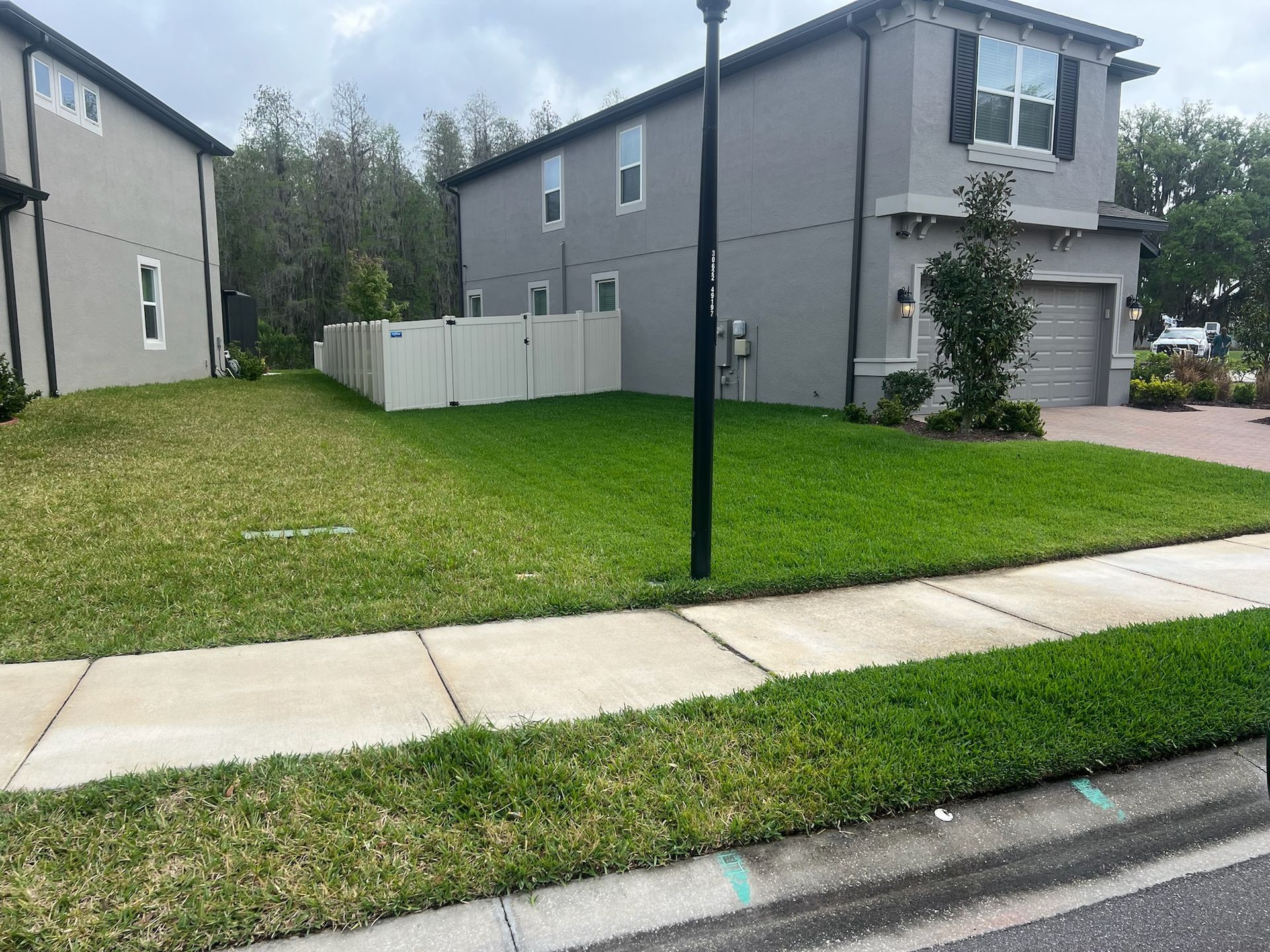A house with a lot of grass in front of it