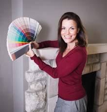 Woman holding pantone color chart