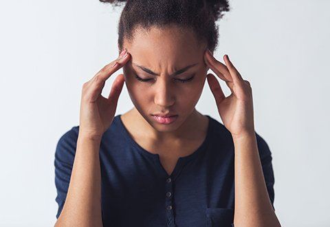 a woman with headache