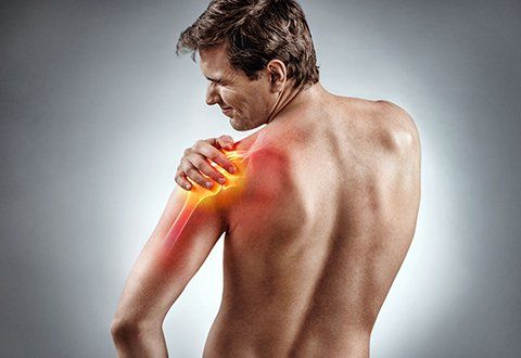 a man with shoulder pain