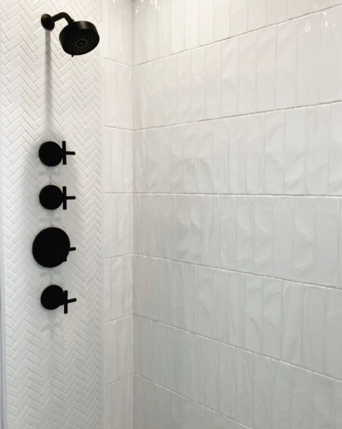Restroom installed white tiles design