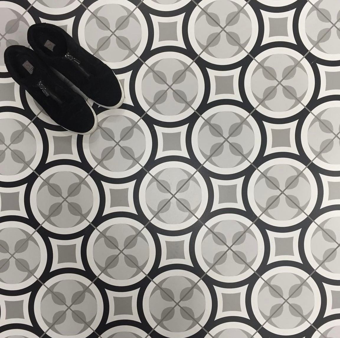 Beautiful Tile Flooring with Black Rubber Shoes