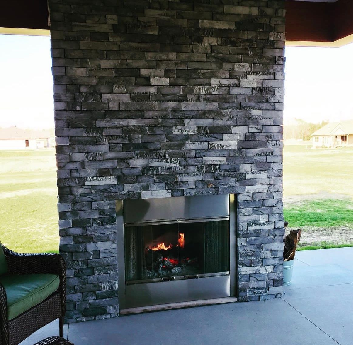 Chimney with newly installed stone tiles