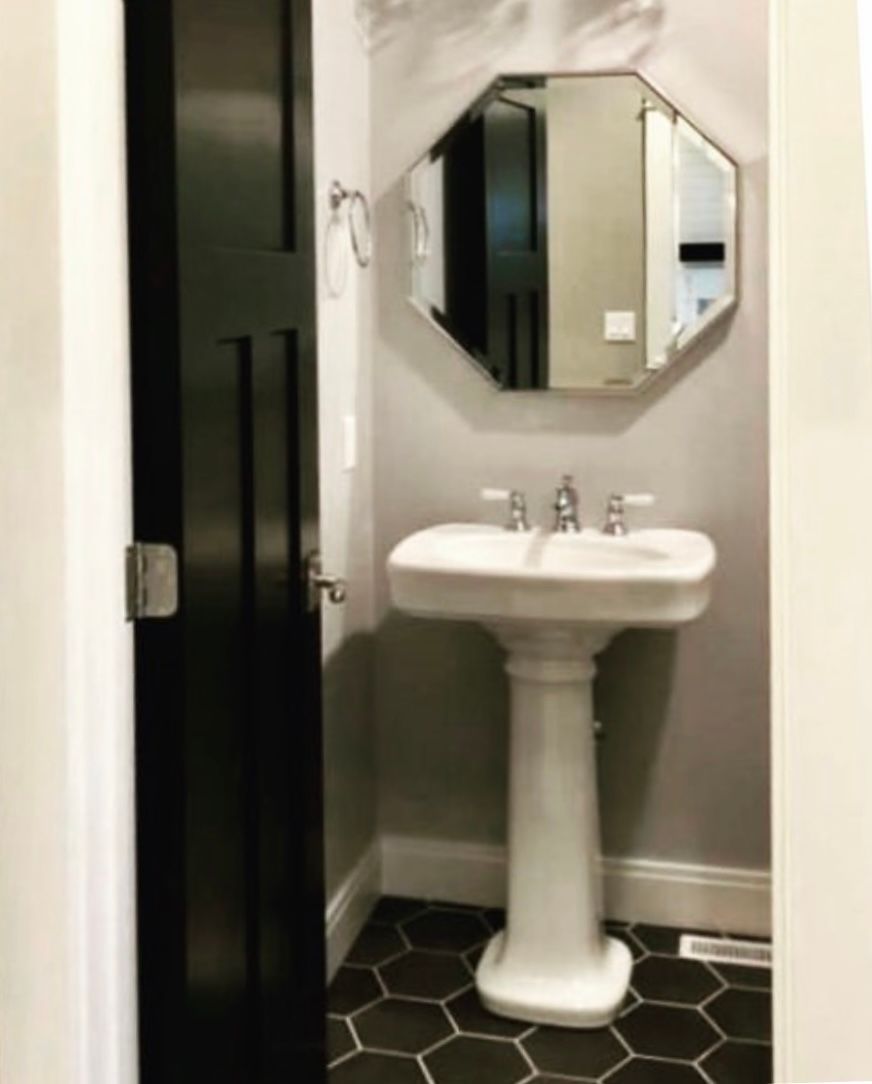 Restroom with glass mirror