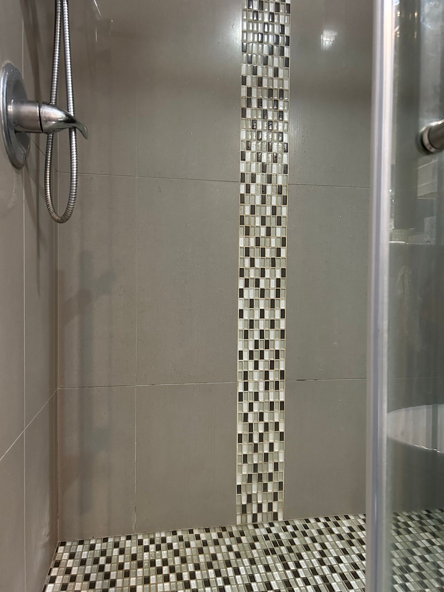 Restroom installed mosaic tiles