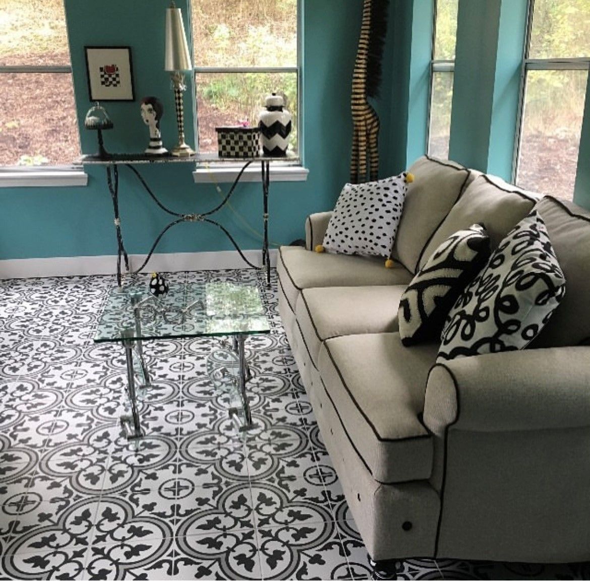 A living room with a couch and a coffee table