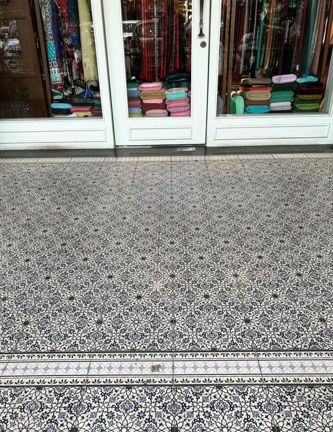 A store front with a lot of boxes in the window