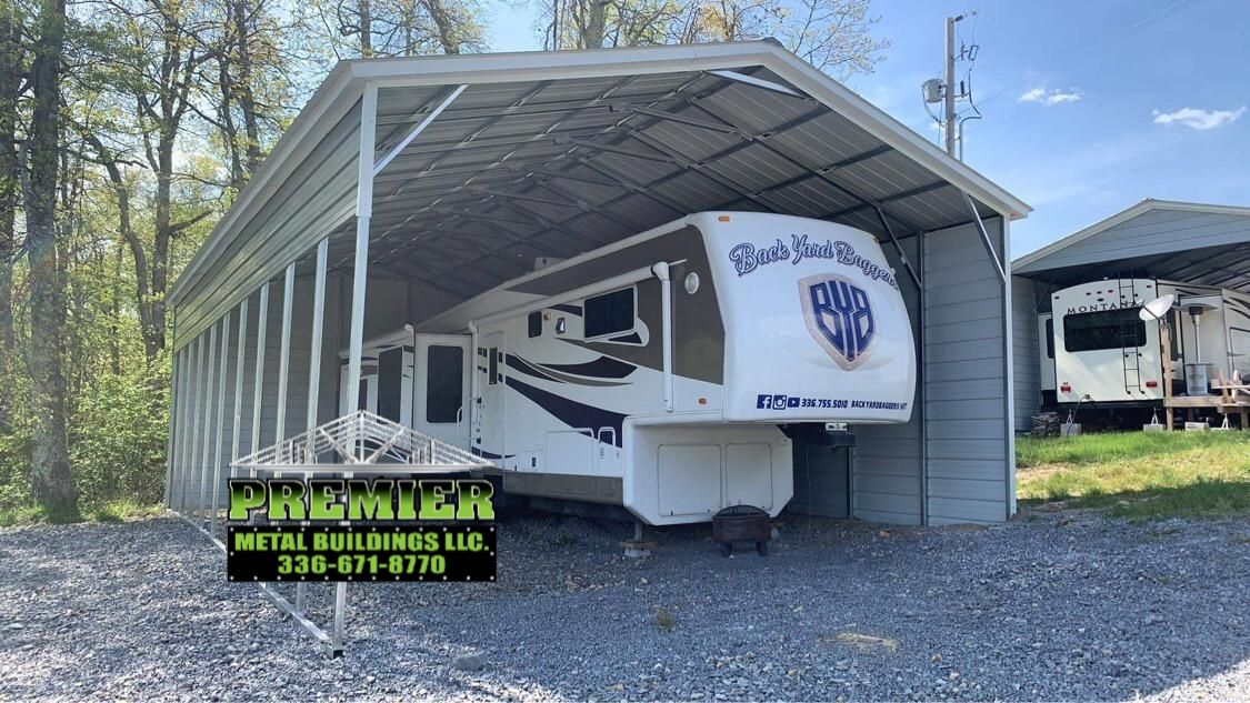 White truck parked on a metal parking with logo
