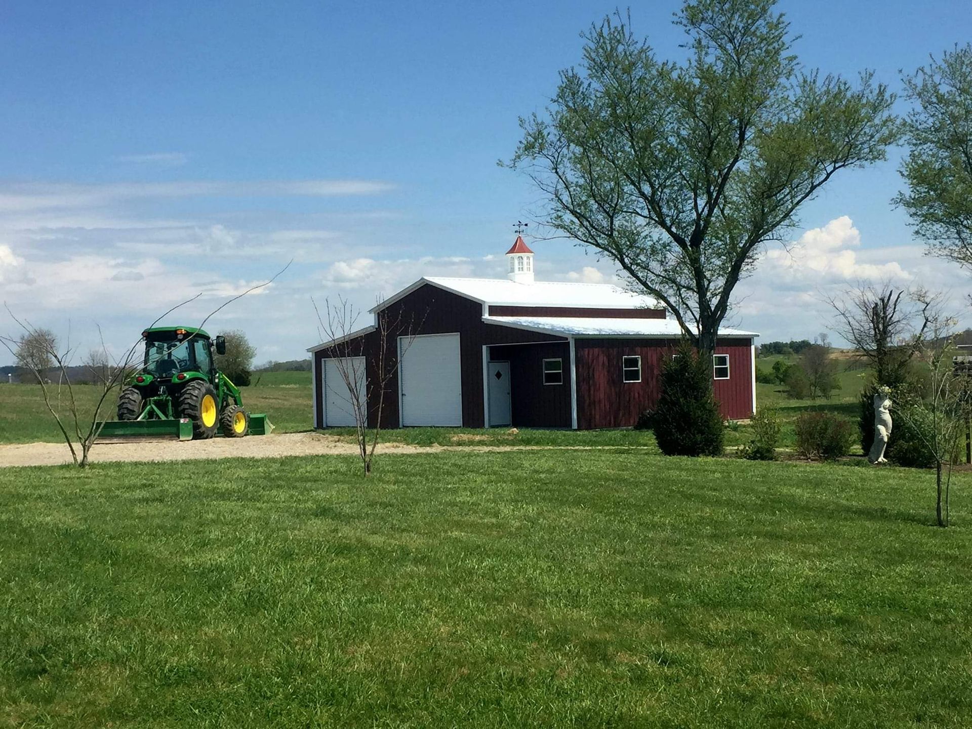 Red barn with trees