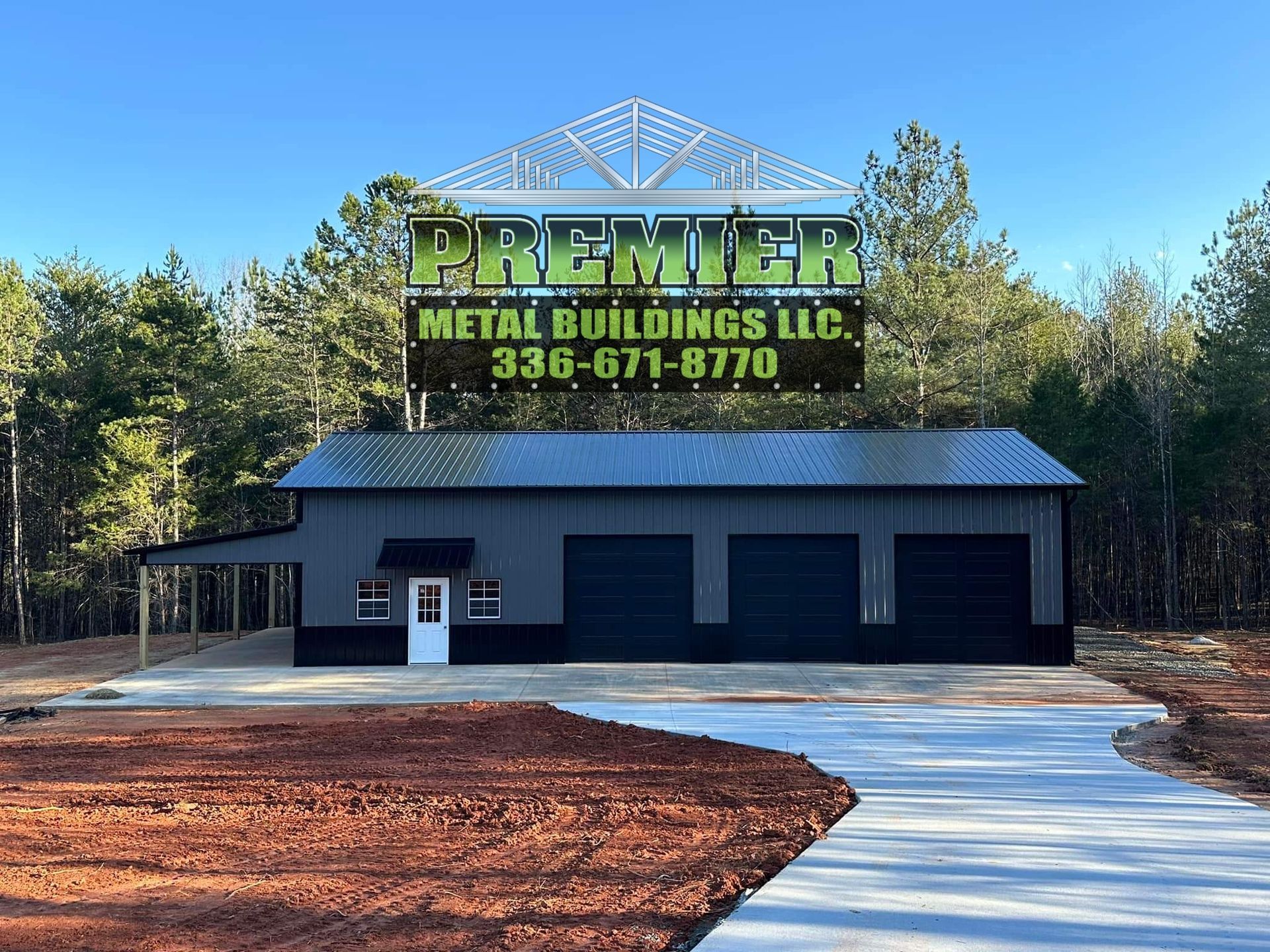 A large metal building with a driveway