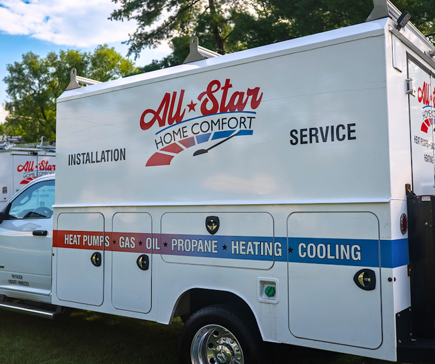 A white service truck branded with 
