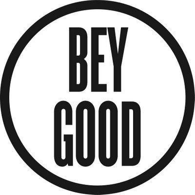 A black and white logo for bey good in a circle.