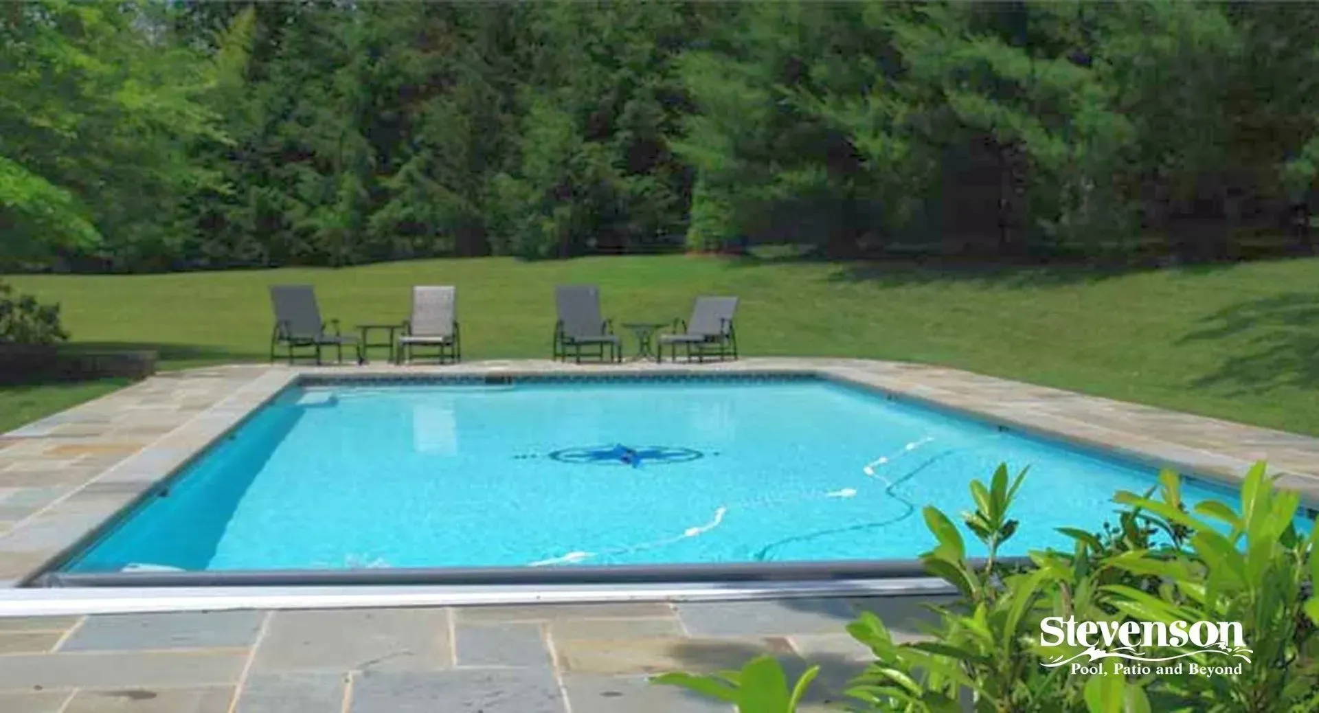 a large swimming pool is surrounded by lawn chairs and trees