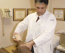 doctor checking on a foot